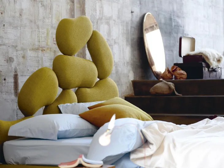 Letto con testiera scultura di design Stones di Noctis